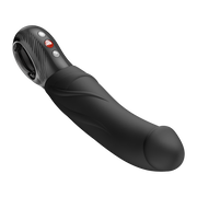 Black, curved silicone G-spot vibrator with a realistic design and textured base with red control buttons.