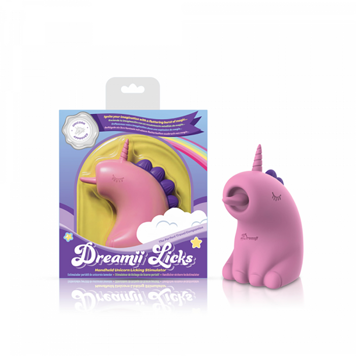 The Dreamy Licks – The Whimsical Unicorn Tongue Vibrator, crafted from body-safe silicone with a pink body and purple mane, is shown beside its colorful rainbow-and-clouds box. This rotating tongue vibe adds whimsy and pleasure to your collection.