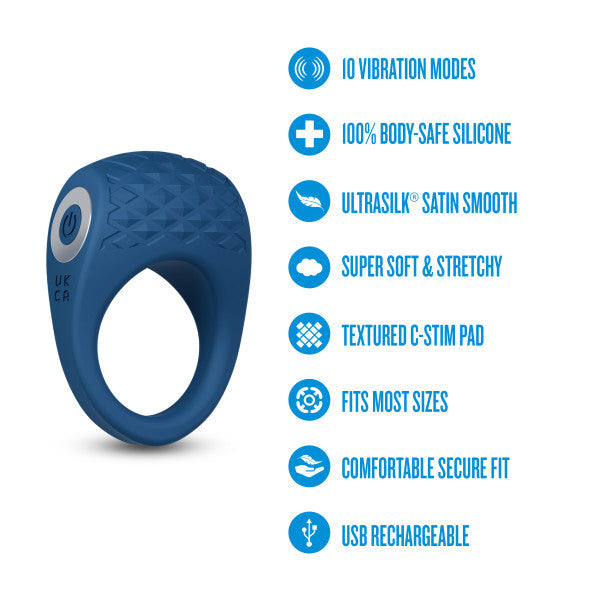 Sleek blue silicone vibrating couples' ring with textured C-stim pad and power button.