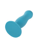 A teal Wave Rider Swell Short, Girthy 5 Inch liquid silicone dildo with a wavy design on the handle and a flat, circular base, isolated on a white background.