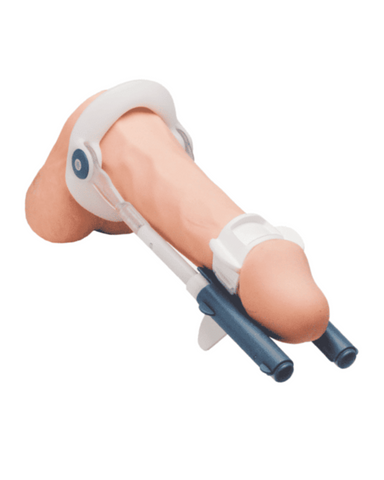 An isolated image of a Male Edge Basic Penis Enlarger Kit - Natural Traction Penis Extender, used for practicing injections and Peyronie's treatment techniques, with a syringe inserted into it.