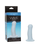 A white, wavy-designed Wave Rider Foam Short, Girthy 4.75 Inch liquid silicone dildo by CalExotics, displayed next to its packaging box emphasizing foam material and strap-on harness compatibility.
