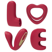 Red silicone couples vibrator set, forming the word "LOVE," with gold accents and a remote.