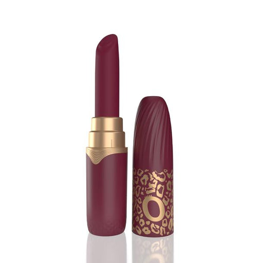 The My Secret Screaming O Premium Lipstick Vibrator is a maroon discreet massager with a gold accent, shown upright with the cap removed. Its cap features a gold leopard print and ring, making it both stylish and subtle.
