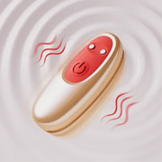 Gold and red vibrating bullet with power button, surrounded by wavy lines.