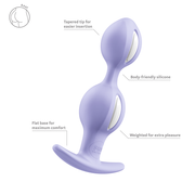 Lavender silicone butt plug with tapered tip, flat base, and white weighted inner balls.