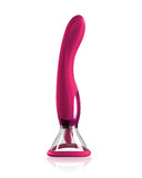 A pink curved Jimmyjane Apex Double Ended Licking, Sucking G-Spot Vibrator with a metallic silver base, standing upright on a reflective white surface, isolated on a white background.