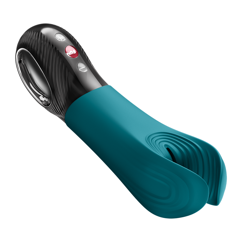 Teal silicone Fun Factory Manta penis stroker with black handle, silver accents, and red power button.