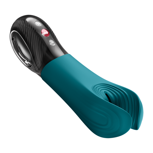 Teal silicone Fun Factory Manta penis stroker with black handle, silver accents, and red power button.