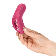 Soft violet Fun Factory Laya 3 lay-on vibrator with ribbed texture, held in a hand.