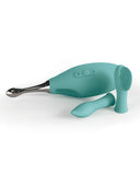 A teal-colored electric facial cleansing brush with a silicone brush head featuring sonic vibrations and a separate small attachment, displayed on a white background.