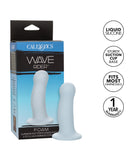Product packaging and item image of the CalExotics "Wave Rider Foam Short, Girthy 4.75 Inch Liquid Silicone Dildo." The box is blue and white, highlighting liquid silicone material, powerful suction cup, strap-on harness compatibility, and a
