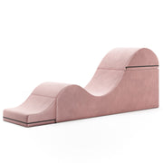 Pink microvelvet Liberator Aria convertible chaise with ergonomic curves and black zippers.
