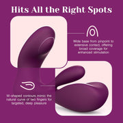 Purple silicone Swirlii vibrator with M-shaped contours and a wide base for dual stimulation.