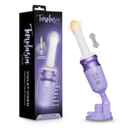 Violet Vixen purple warming thrusting vibrator with white tip, digital display, and suction mount.