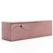 Pink microvelvet Liberator Aria convertible sex chair and bench, folded into a discreet end-of-bed bench.