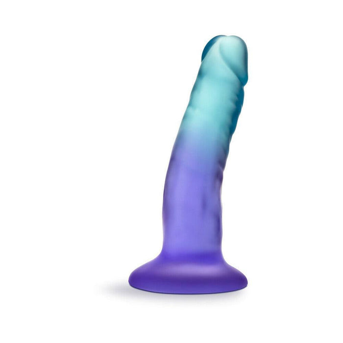 The Morning Dew Small 5 Inch Dildo with Suction Cup - Blue features a light blue to purple gradient, stands upright with a flared suction cup base, is strap-on compatible, and ideal for beginners.