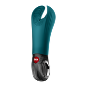 Teal silicone Fun Factory Manta vibrating penis stroker with black base and silver ring handle.