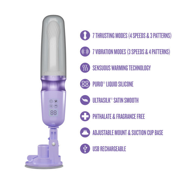Violet Vixen purple warming thrusting vibrator with clear cover, digital display, and suction mount.