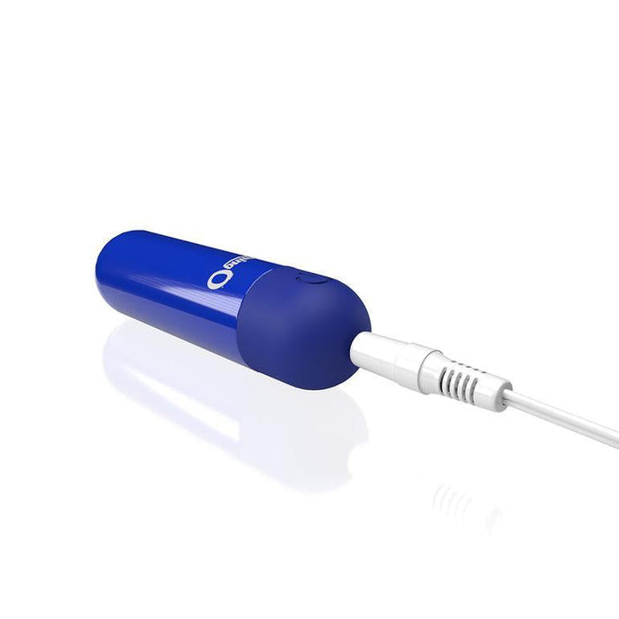 The Screaming O Powerful Rumbly Rechargeable Blue Bullet Vibrator, featuring a blue cylindrical shape, is USB rechargeable and waterproof, shown with a white cable connected at one end against a white background.