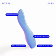 The Dame Dip Beginner's Internal & External Silicone Vibrator in Periwinkle features a blue curved design, increased squish, USB-C charging, a low-battery indicator, and stands upright. Branded as “WHAT’S NEW” and “DIP 2.0”—perfect for beginners.
