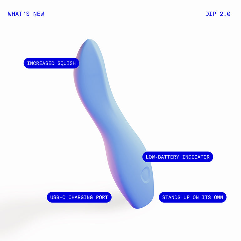 The Dame Dip Beginner's Internal & External Silicone Vibrator in Periwinkle features a blue curved design, increased squish, USB-C charging, a low-battery indicator, and stands upright. Branded as “WHAT’S NEW” and “DIP 2.0”—perfect for beginners.