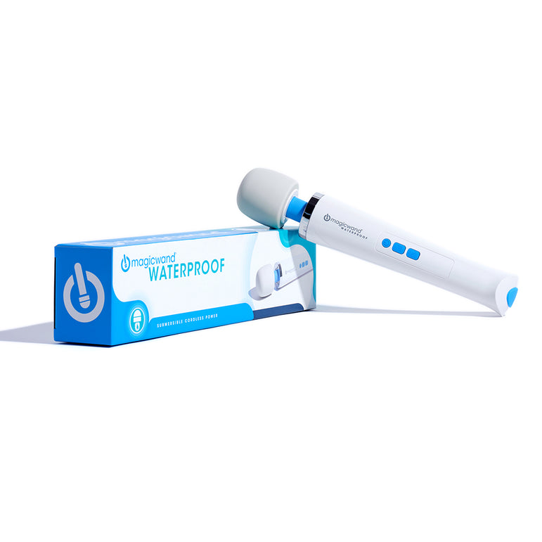 The Magic Wand Waterproof Rechargeable Cordless Vibrator, shown next to its blue and white box, features a white handheld design with a rounded head and simple control buttons on the handle.