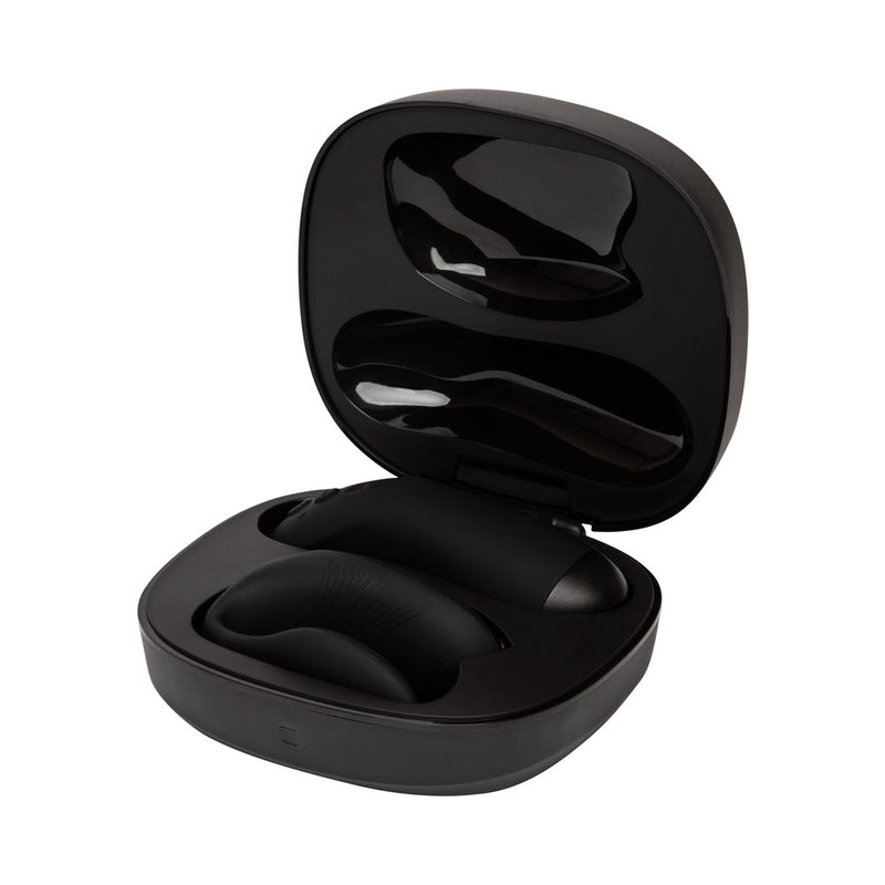 An open We-Vibe Chorus Pro Wearable Couples' Vibrator with Triple Motors & Remote is shown against a white background—crafted for couples and designed to deliver powerful sensations with innovative technology.
