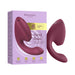 A maroon Womanizer Next Duo Pleasure Air + Vibration Blended Orgasm Stimulator stands by its box, which features the product name, highlights “Advanced 3D Pleasure Air with G-Spot vibrations,” and shows a product image on a purple background.