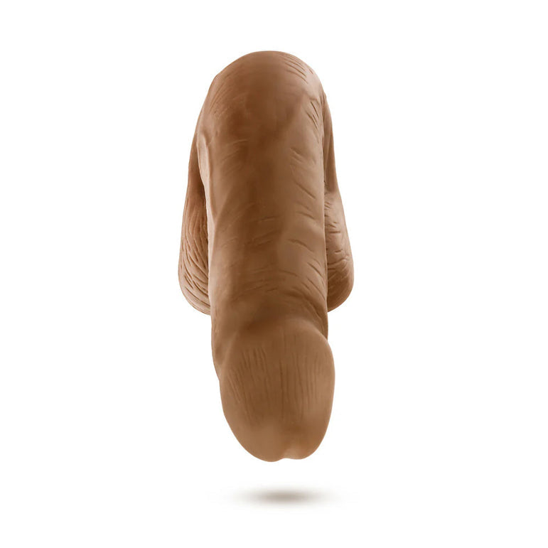 A close-up of the URSELF 5 Inch Chocolate Silicone Packer Dildo, crafted from body-safe platinum-cured silicone for a realistic look and feel.