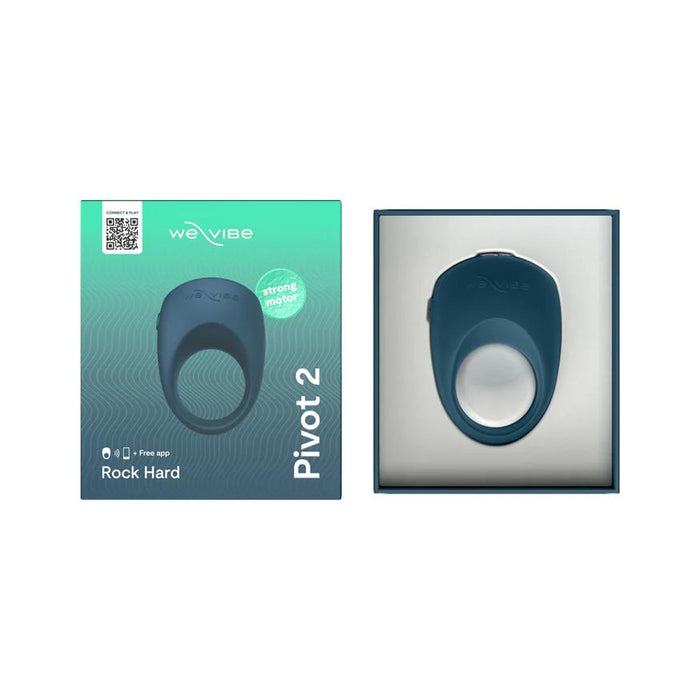 A blue We-Vibe Pivot 2 Vibrating Silicone Rechargeable Penis Ring sits beside its teal box with white text. The packaging features a “stronger motor” and app compatibility, positioning it as an ideal couples vibrator.