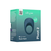 A teal box features the We-Vibe Pivot 2 Vibrating Silicone Rechargeable Penis Ring in dark blue, offering hands-free clitoral stimulation, a strong motor, app compatibility, wave design, QR code, and the product name on the front.