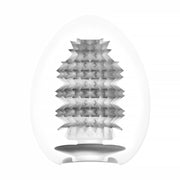 The Tenga Egg Standard 3 Pack Disposable Masturbators I features translucent, egg-shaped sleeves with spiky, star-patterned textured interiors and a bottom opening, all displayed against a white background.