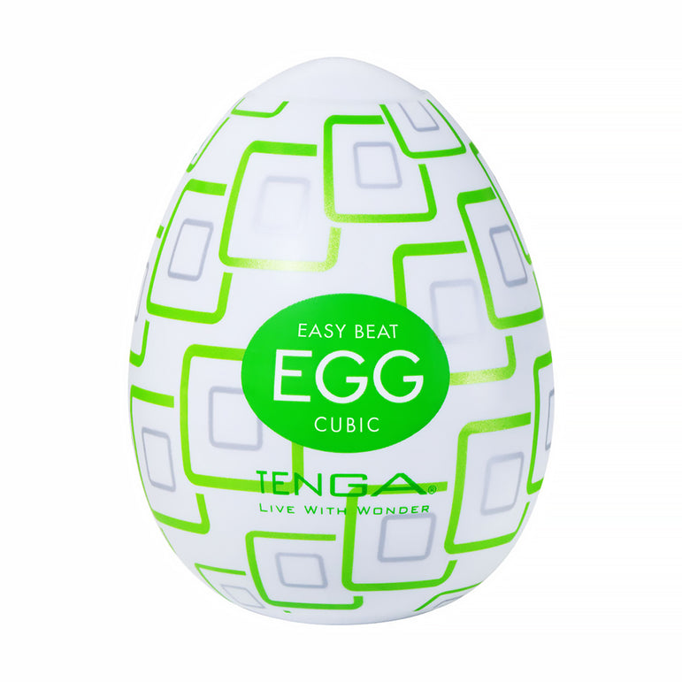 A white Tenga Egg Standard 3 Pack Disposable Masturbators I, decorated with a green geometric pattern and "Easy Beat Egg Cubic Tenga Live With Wonder" text, features a textured sleeve designed for male use.