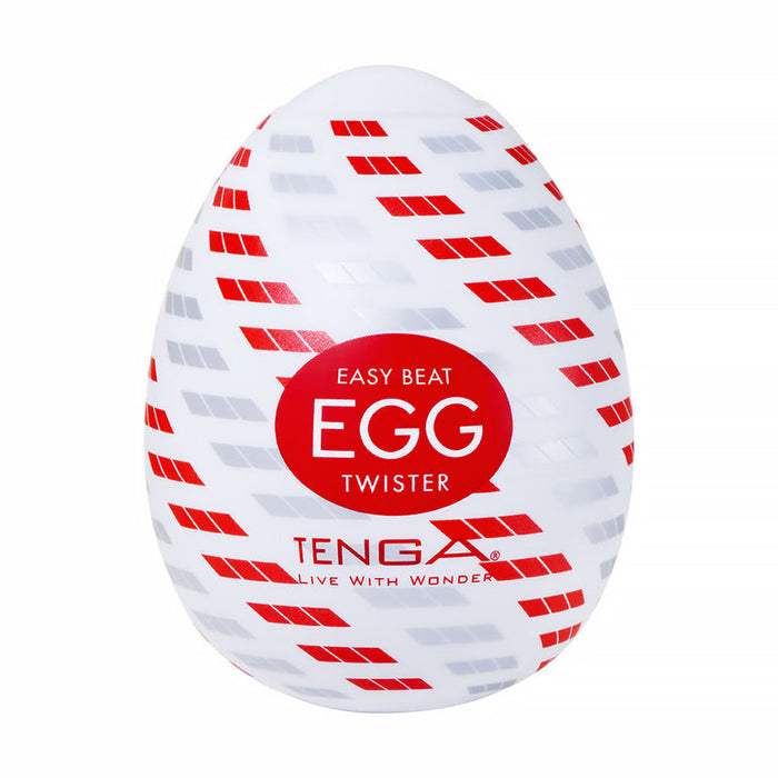 A white, egg-shaped Tenga Egg Standard 3 Pack Disposable Masturbators II stroker featuring red and gray diagonal patterns, with a central red circle displaying "EASY BEAT EGG TWISTER" and "TENGA LIVE WITH WONDER" in white text.