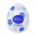 A white, egg-shaped masturbator with blue and silver ovals. The label reads "Easy Beat Egg Bouncy" above "TENGA Live With Wonder." This is part of the Tenga Egg Standard 3 Pack Disposable Masturbators II, designed for pleasure.