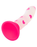 A pink Glow Stick Heart Silicone First Time Glow in the Dark Dildo with heart shapes isolated on a white background by CalExotics.
