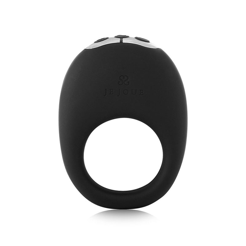 The Je Joue Mio Vibrating Cock Ring - Black is an oval-shaped, black silicone ring with a circular bottom opening, simple top button controls, and the elegant Je Joue Mio logo embossed on the front.