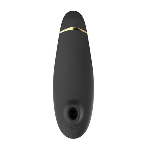Sleek black silicone Womanizer Premium 2 clitoral stimulator with gold accent and Pleasure Air technology.