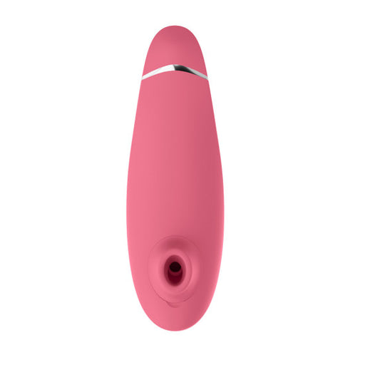 Womanizer Premium 2 Pleasure Air Clitoral Stimulator in pink, made of body-safe silicone with a silver accent.