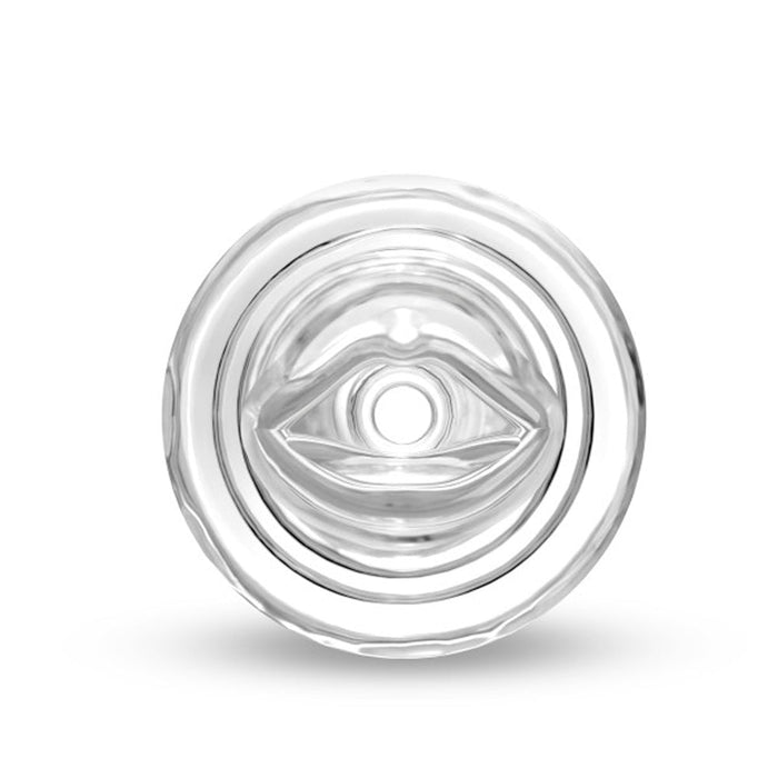 A close-up view of the ***All Nighter Glow in the Dark Textured Clear Self Lubricating Stroker*** by ***Blush***, showcasing its transparent, circular design with a central opening that forms a concentric ring pattern, against a plain white background. The stroker appears clean and the central hole is clearly visible, highlighting its ultra-stretchy and reversible structure.