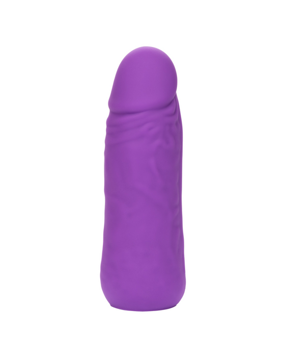 A premium silicone Vibrating Stud Mini Cock Shaped Bullet Vibrator - Purple by CalExotics, designed with a phallic shape, rounded tip, and subtle detailing along the sides. The smooth and flexible surface promises powerful speeds of vibration. Set against a plain white background, its vivid color and shape stand out brilliantly.