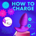 Infographic on how to charge the BANG! Rotating & Vibrating Silicone Butt Plug with Remote by XR Brands. The image depicts the silky-smooth silicone butt plug connected to a USB cable and notes a 2-hour charging time for 50 minutes of run time. The text emphasizes versatility, ease of charging, and the importance of removing it from the charger once fully charged.