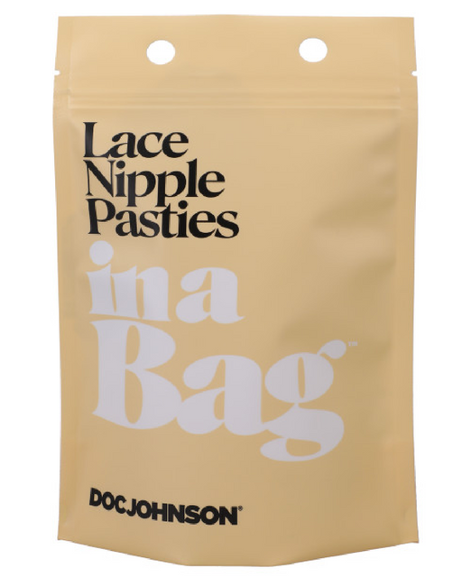 A beige resealable bag with two holes at the top for hanging, labeled "Black Vegan Leather and Lace Nipple Pasties In a Bag" in black and white text. The bottom of the bag has the brand name "Doc Johnson" printed in black. These eco-friendly sex toys come with silicone glue backing for easy application and removal.