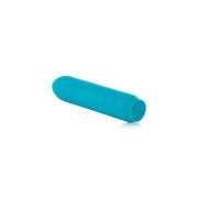 The Je Joue Powerful Classic Bullet with Finger Sleeve in teal is a small, cylindrical vibrator with a rounded tip and three side buttons, delivering rumbly vibrations and USB rechargeability, shown isolated on a white background.