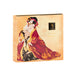 A decorative box featuring traditional Japanese-style art of an embracing couple in elaborate kimonos, set on a light gold background, with text reading "Shunga Advent Calendar of Desires – 25 Days of Luxury, Pleasure & Passion"—a perfect sensual gift.