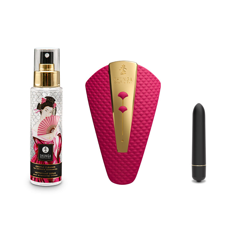 The Shunga Advent Calendar of Desires – 25 Days of Luxury, Pleasure & Passion features a floral spray bottle, a pink-and-gold textured massager, and a small black cylinder, elegantly arranged on a white background.