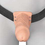 Vanilla 6-inch Elite Silicone hollow dildo with realistic texture, attached to a black strap-on harness.