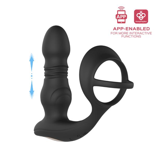 The Cyrus App-Enabled Thrusting Prostate Vibe + Cock Ring is a black silicone anal plug with a built-in cock and ball ring, offering app control, thrusting action, and interactive prostate or perineum massage features.