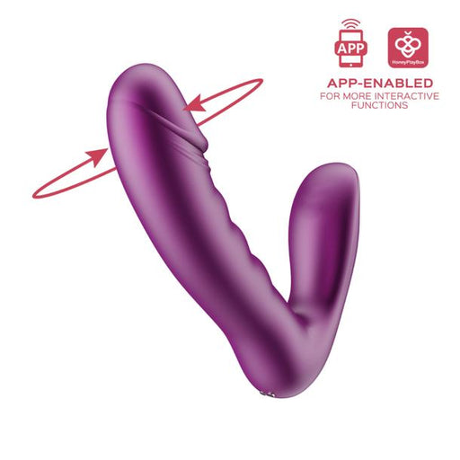 The Rora 2 App-Controlled Rotating G-Spot Vibrator & Clit Stimulator by Honey Play Box is a purple, curved, dual-ended toy with a textured shaft. Arrows show rotation and icons highlight that it’s app-enabled for more interactive functions.